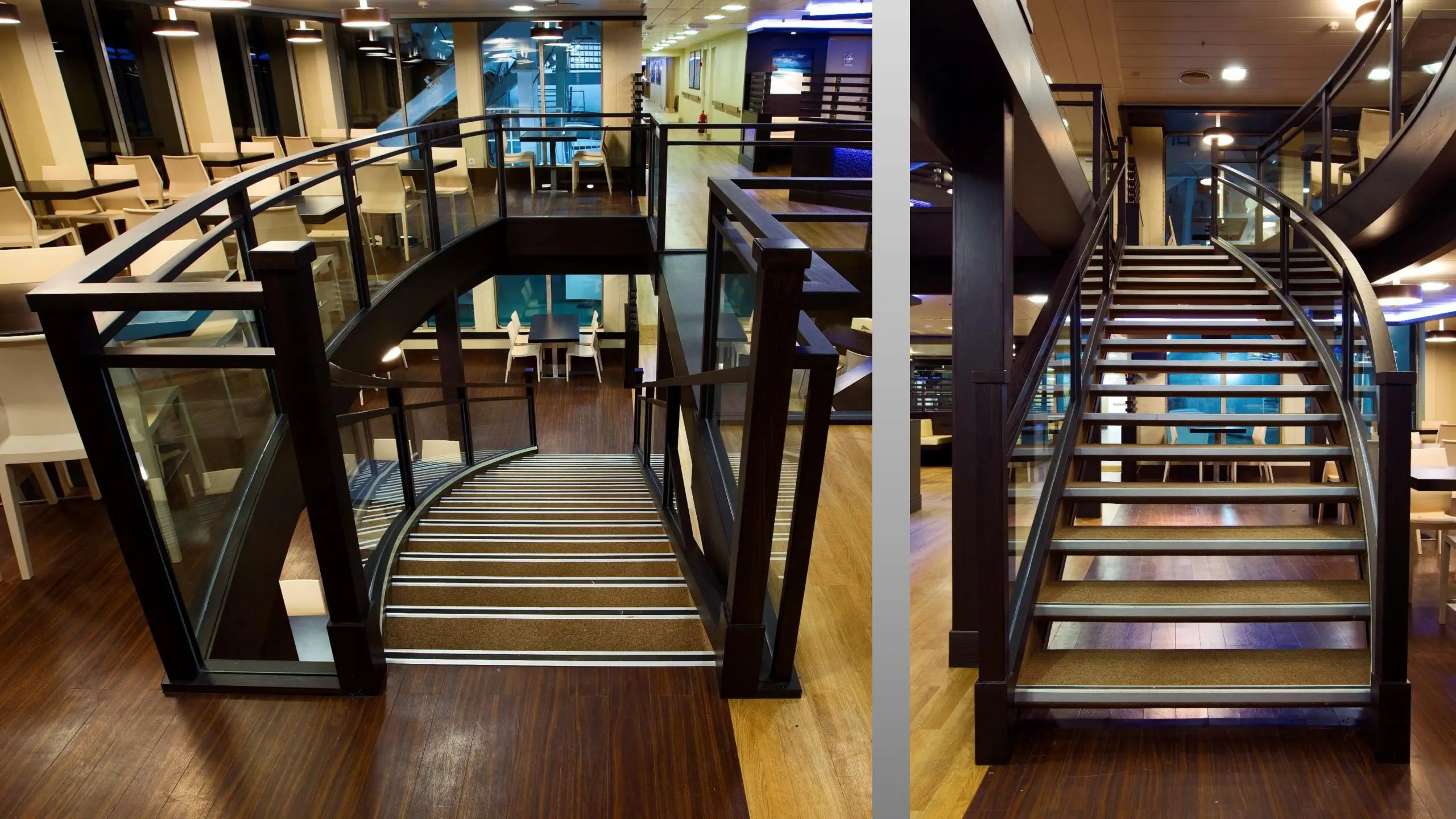 Modern wooden staircase with glass railings.